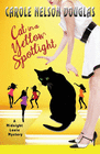 CAT IN A YELLOW SPOTLIGHT